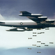 A B-52F nicknamed “Casper The Friendly Ghost” from the 320th Bomb Wing drops Mk 117 750 lb bombs over Vietnam circa 1965 (US Air Force)